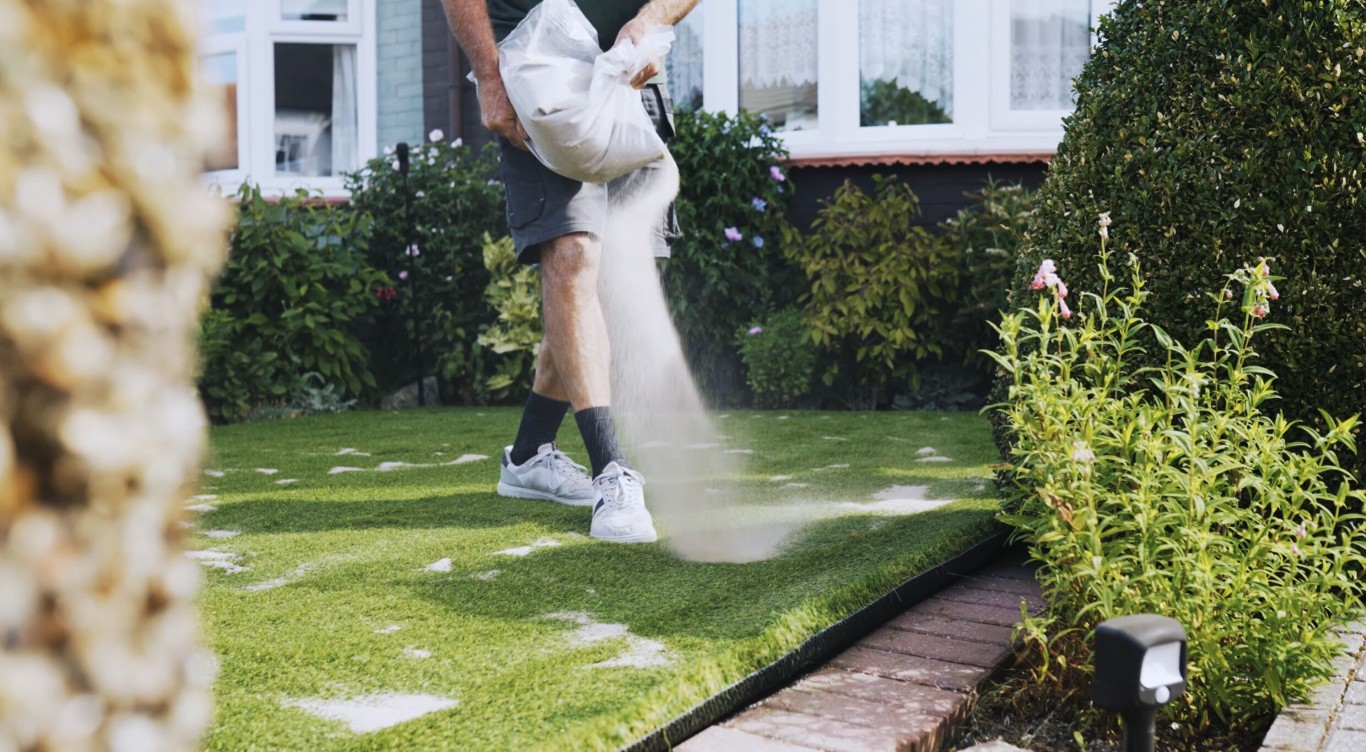 Installing pet-safe artificial grass with drainage system